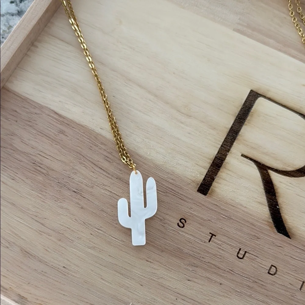 Gold Necklace with White Crescent Pendant